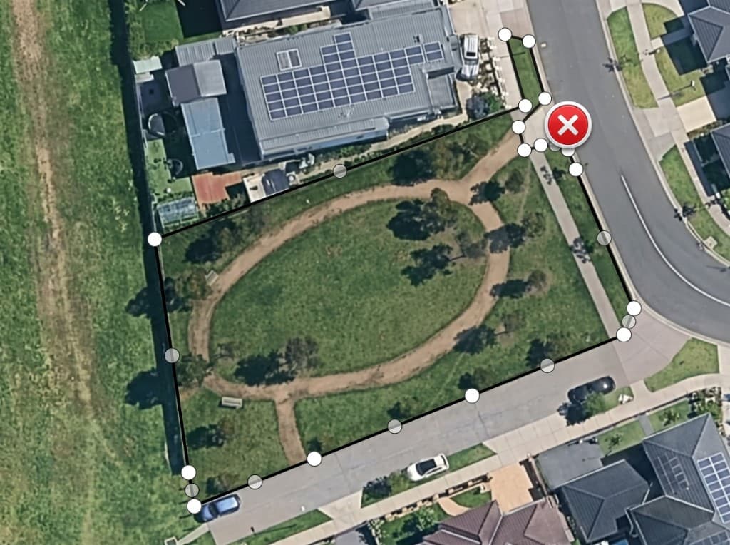 Aerial view of a lawn with a measured boundary drawn around it